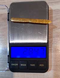 weighing Refined Gold